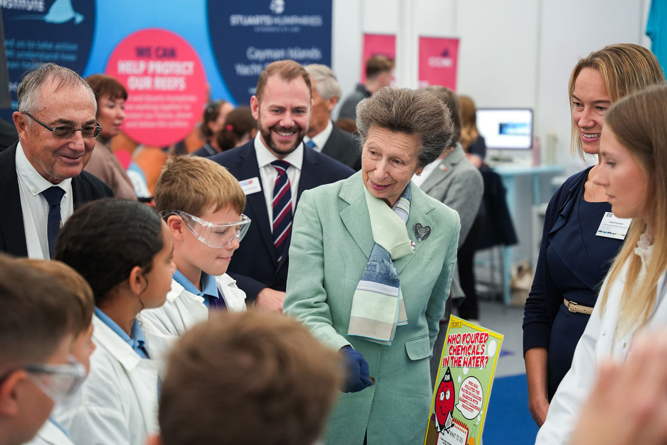 HRH The Princess Royal talks to children on the RYA stand at the Southampton International Boat Show