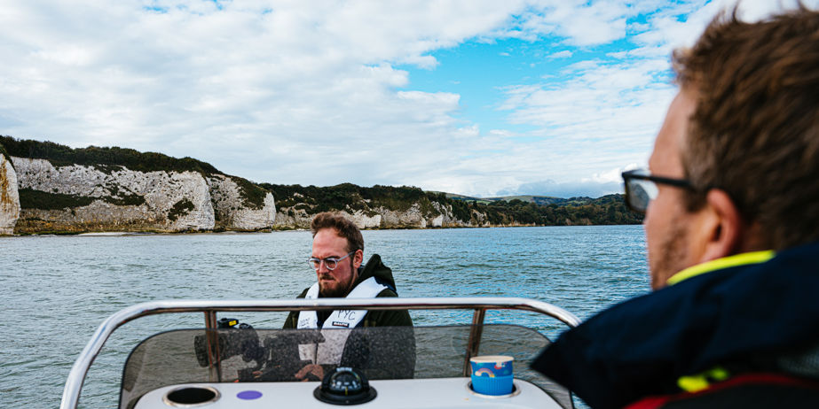 Powerboaters working on the water
