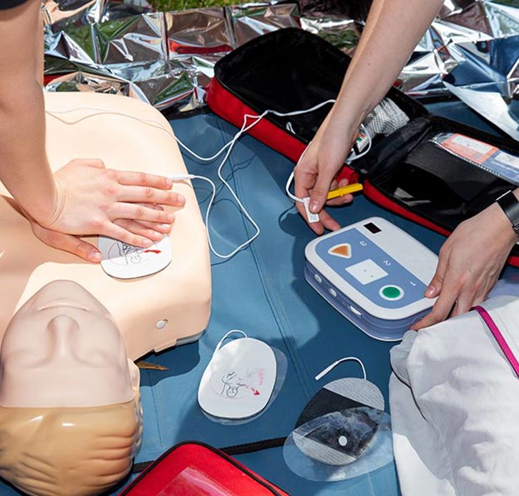 close up of CPR training with dummy