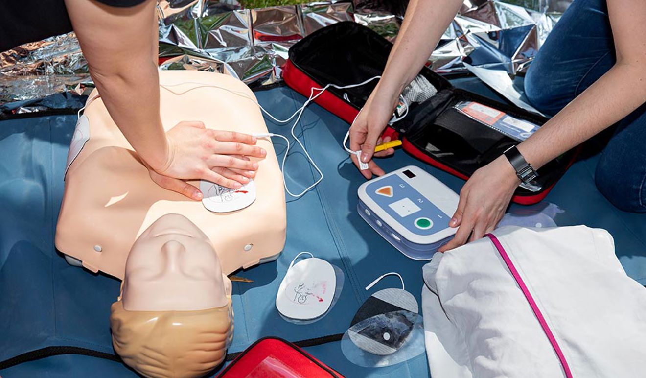 close up of CPR training with dummy