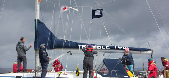 crew adjusting the sails