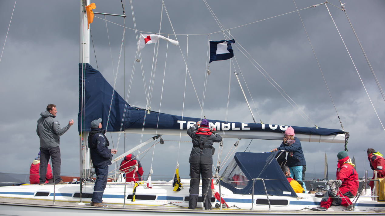 crew adjusting the sails