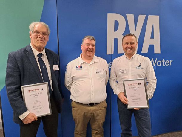 Drew recieving his RYA Unsung Hero award, joined by RYA Scotland Chair Brian Wilson, and fellow award winner Duncan Hepplewhite