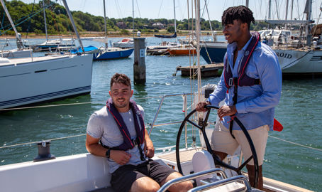 Two men on a boat in sunny weather