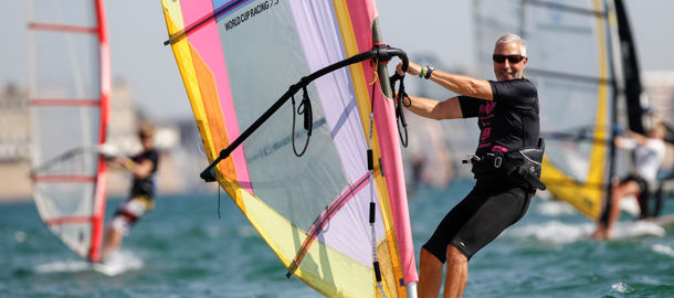 older gentleman windsurfing