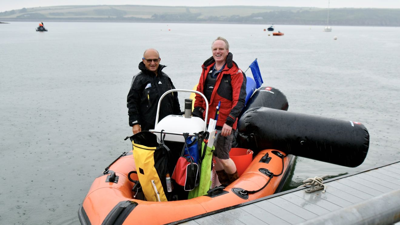 Moley Morsley (left) with a fellow volunteer preparing a RIB for mark laying at the Welsh Regional Junior Championships 2025