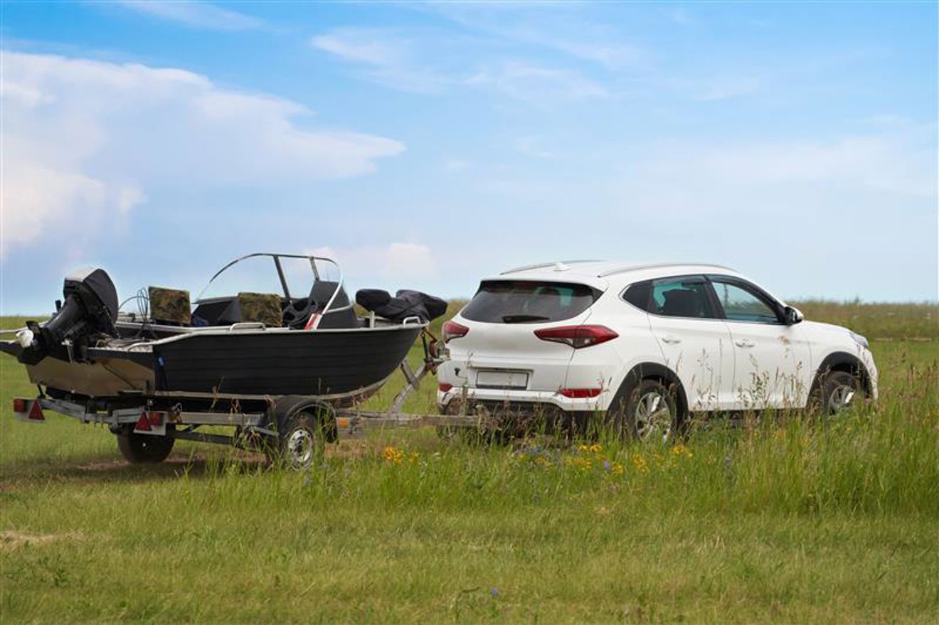 towing a boat on grass