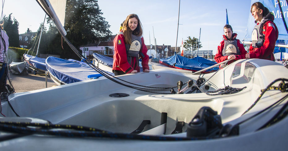 members stood near their boat