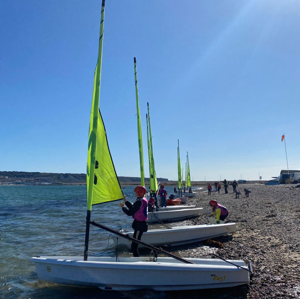 dinghies about the enter the water