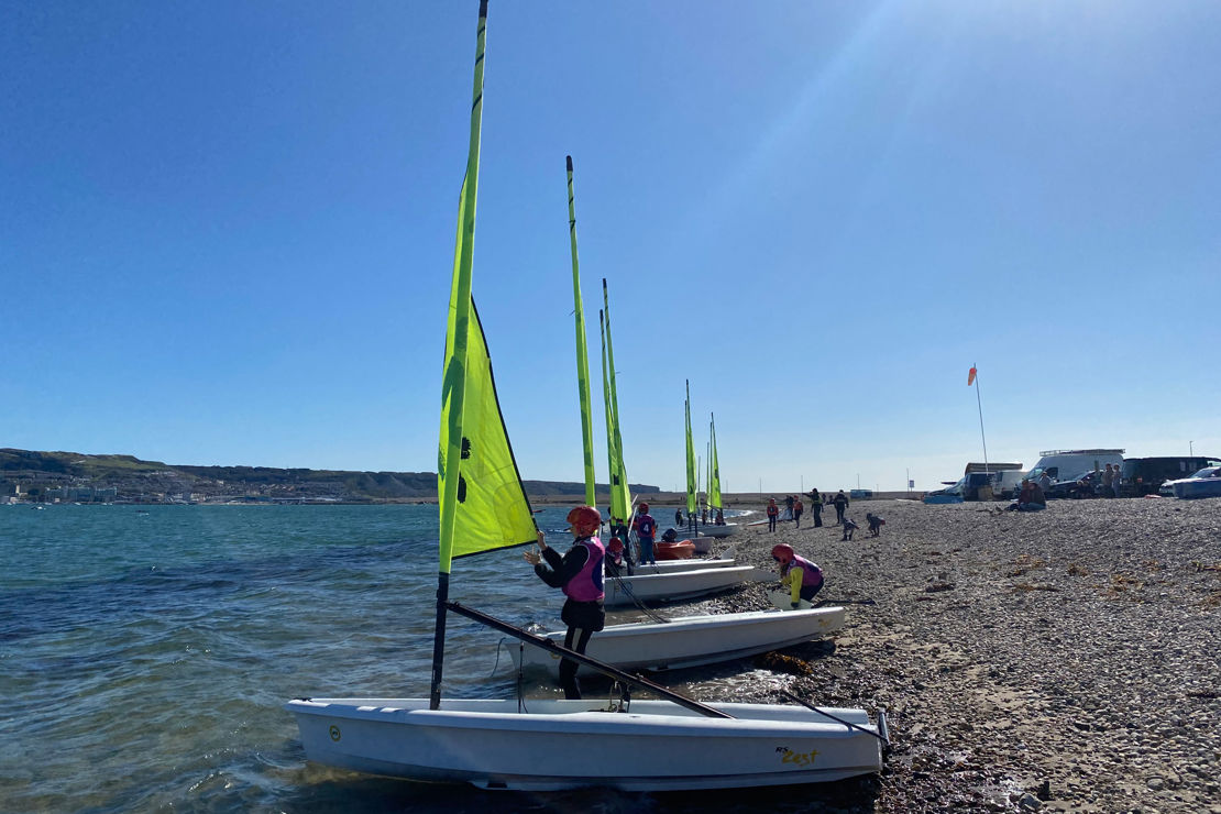 dinghies about the enter the water