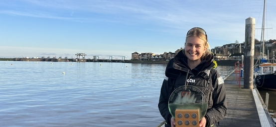 Merle Nieuwland at Cardiff Bay YC with the Welsh Young Sailor of the Year trophy (c) RYA CW