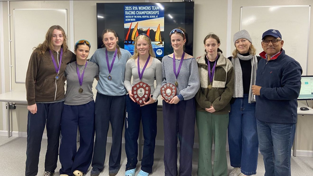 Left to right: Winning team Daisy Adams, Abbey Penny, Anna Edmonds, Sarah Davis (captain), Scarlett MacLennan and Sophia Hiller, with RHS Headmaster Irfan Latif and his wife Jo who presented the prizes © RHS.