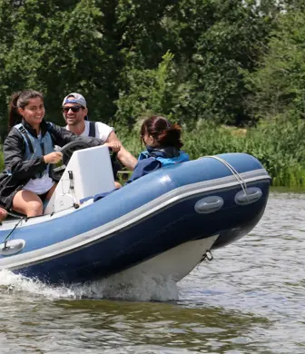 Summer 2023: People on a rigid inflatable boat (RIB) during a Powerboat Level 2 course