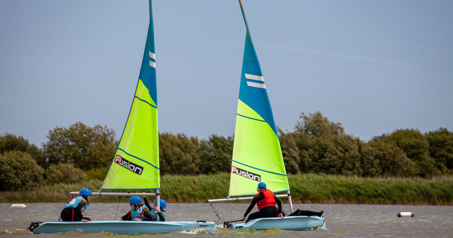 two small sail boats