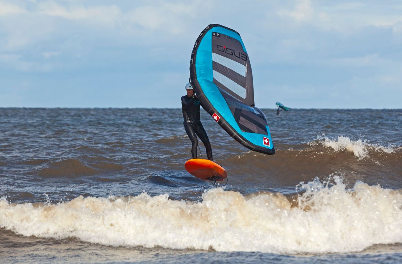 Shot of windsurfer travelling through the water