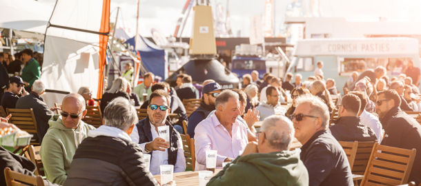 Sitting in the sunshine drinking at Southampton boat show 