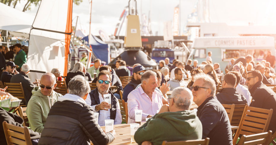 Sitting in the sunshine drinking at Southampton boat show 