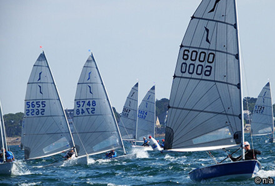 A group of boats part of the Solo national class