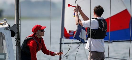 Volunteers preparing for a dinghy race