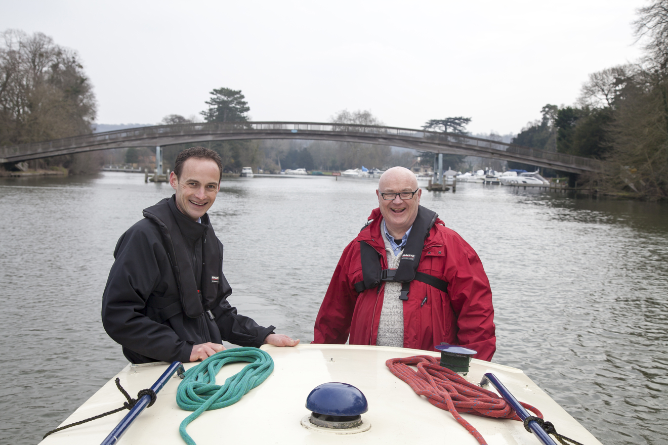 two gentleman on a narrow smiling and looking relaxed