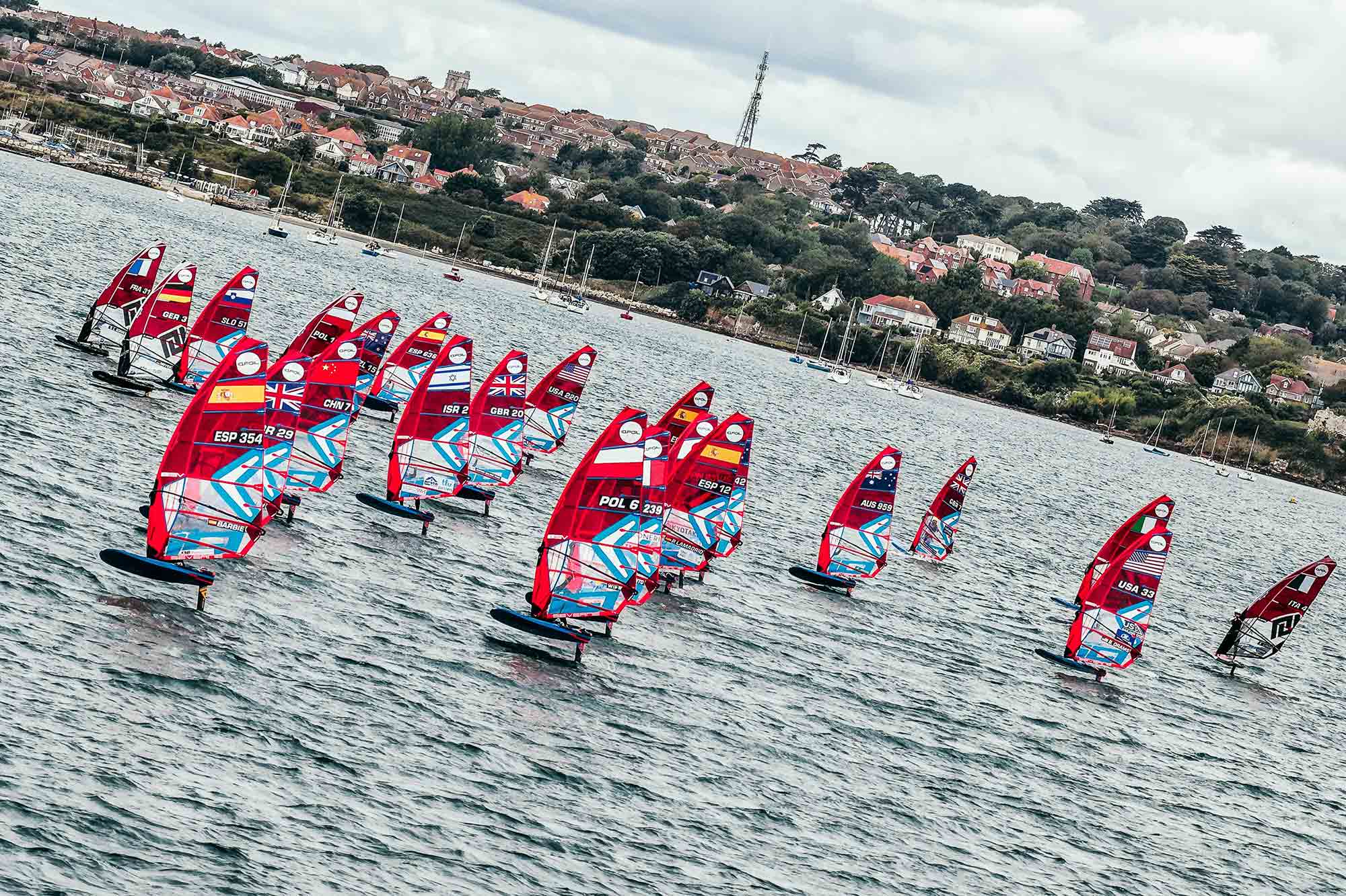wide shot of iQFOiL windfoilers on event day