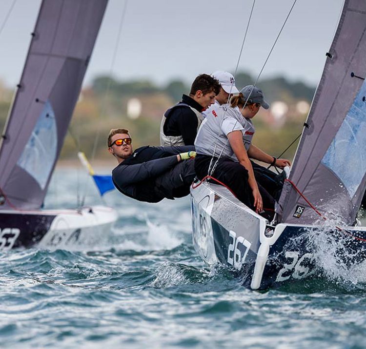 close up of numerous dinghies racing