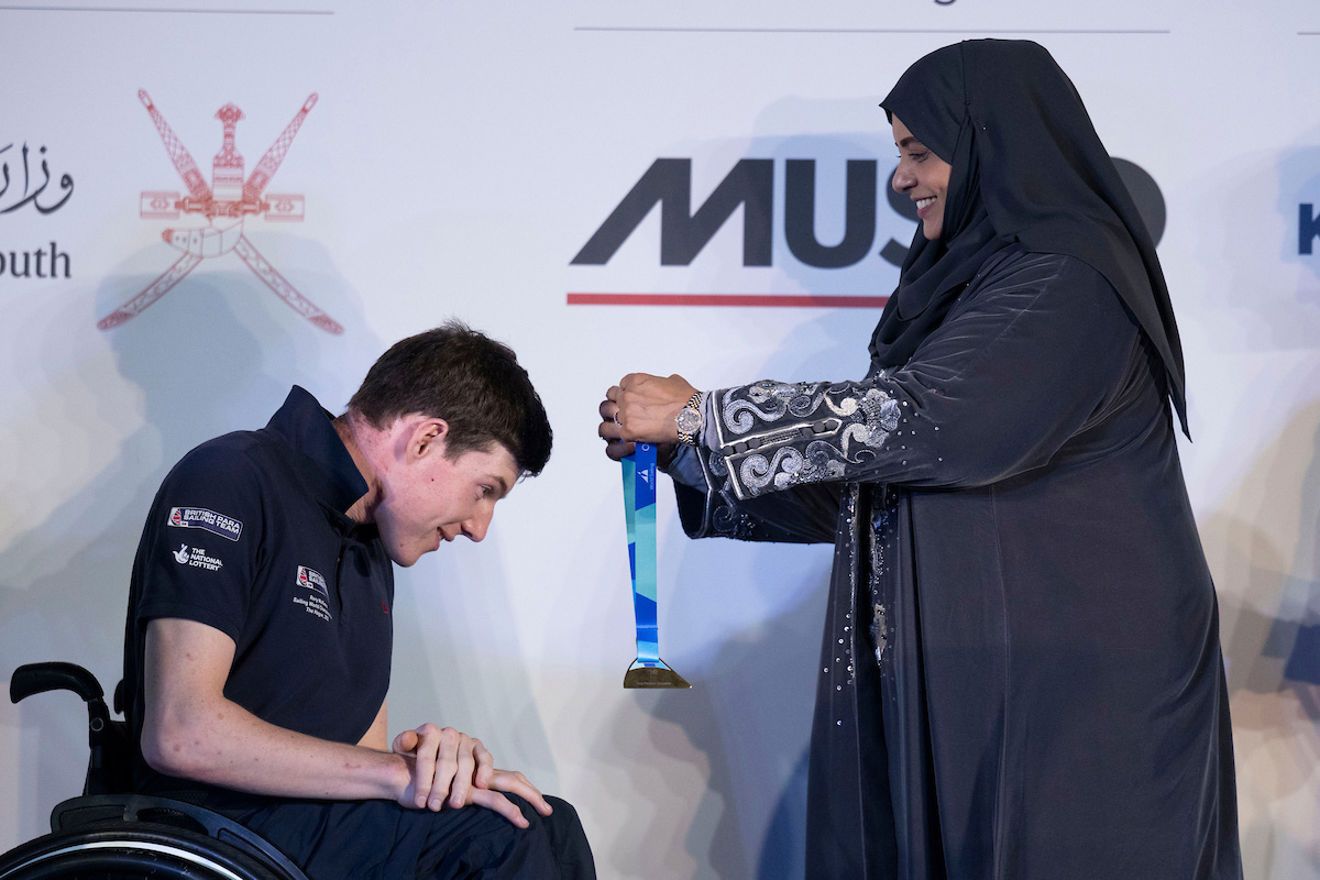 Rory McKinna picks up his bronze medal at the World Sailing Inclusion Championships