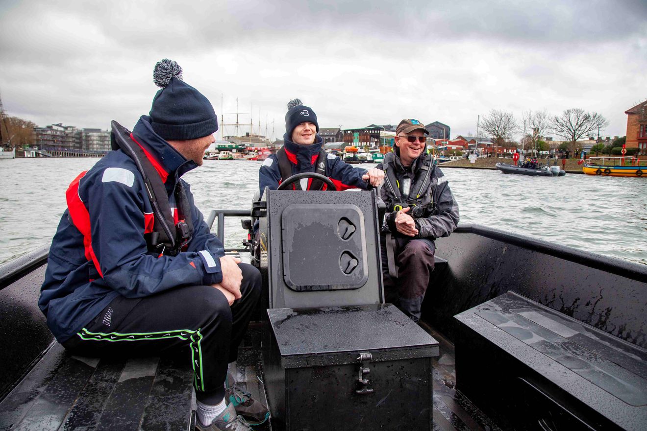 Young people on a boat as part of the new horizons project