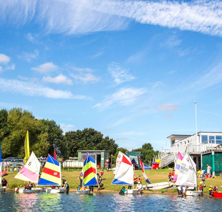 Optimists On Shoreline With Club Test