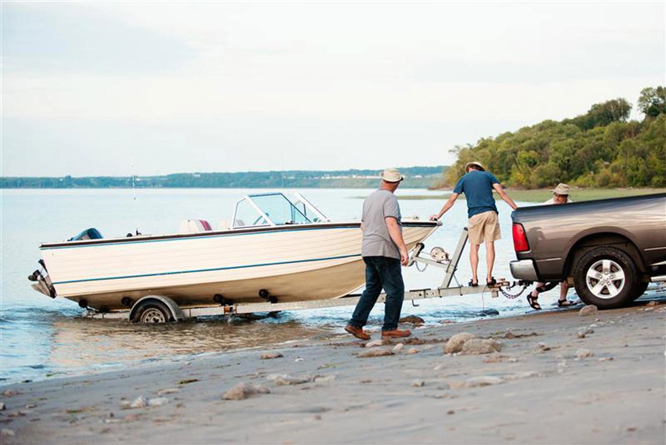 Car being towed out of the water