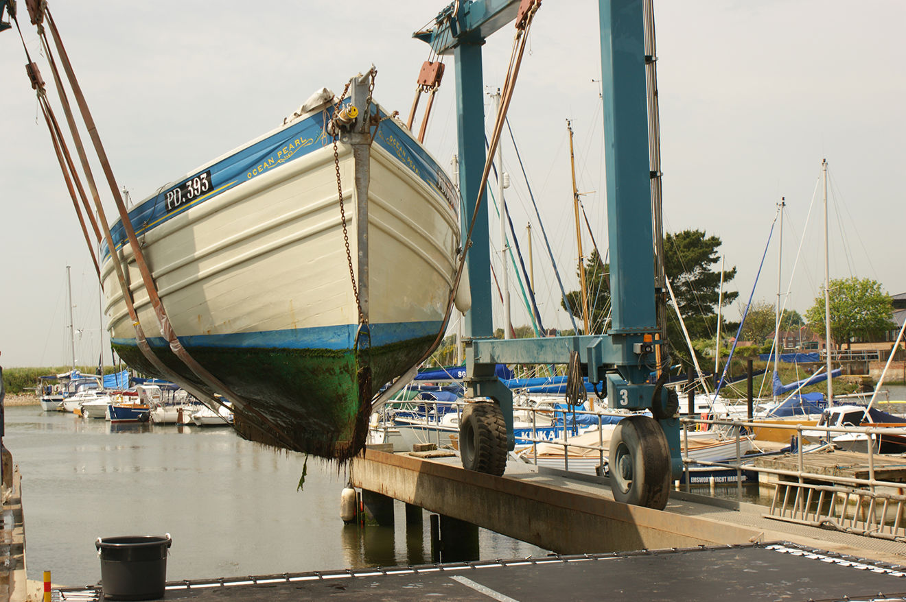 boat being lifted out of the water