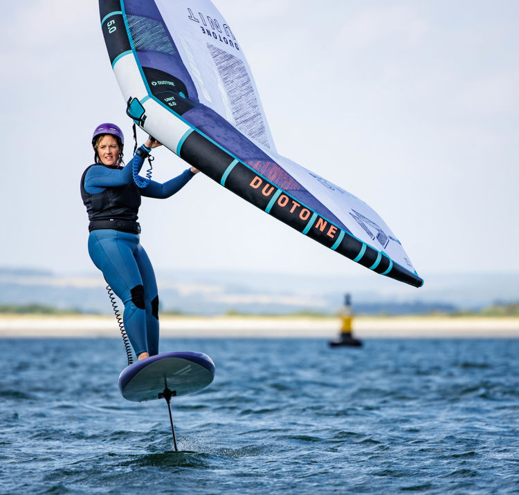 An image of a wind surfer wearing a wing leash