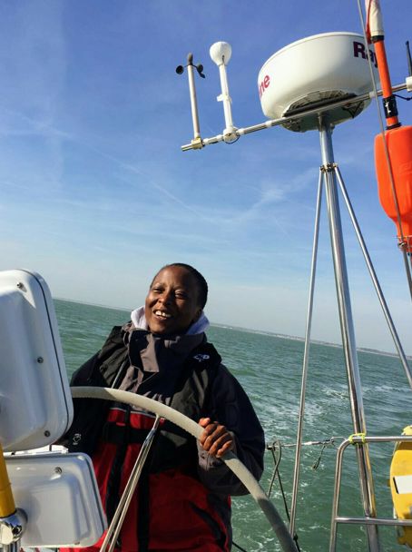 mid shot of smiling women on a yacht the open sea