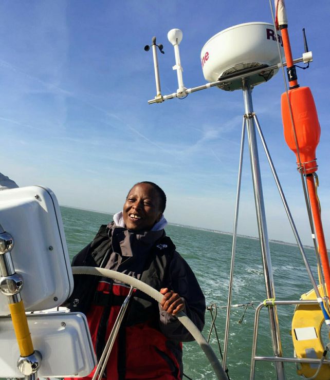 mid shot of smiling women on a yacht the open sea