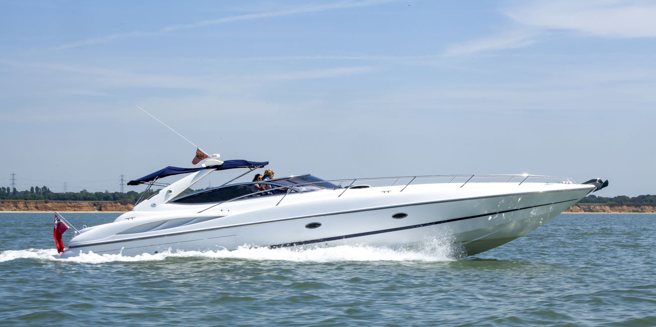 motor cruiser speeding across the ocean