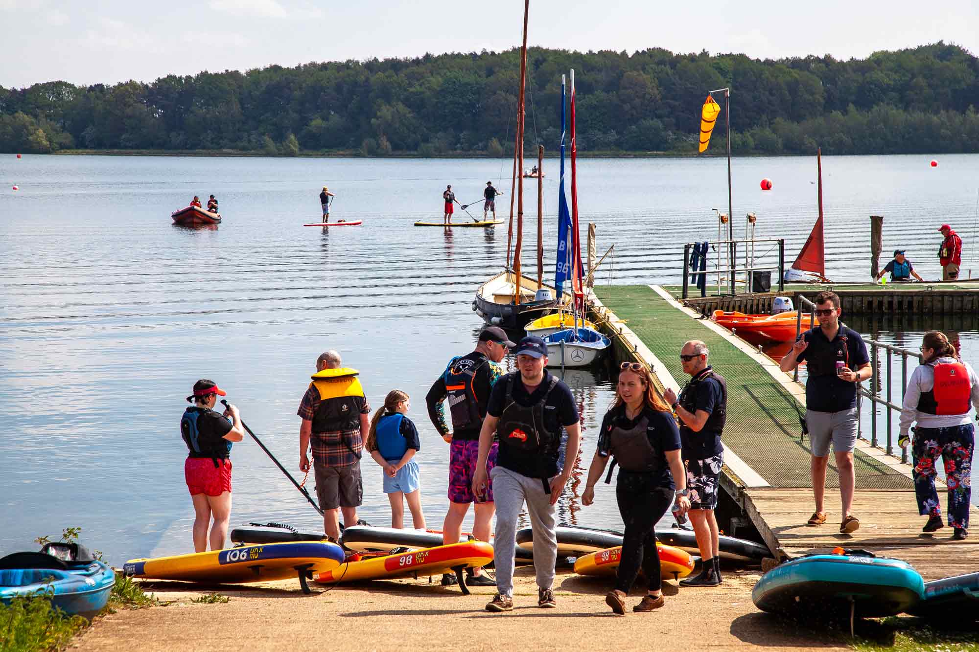Long shot of people on dock of Northampton Sailing Club