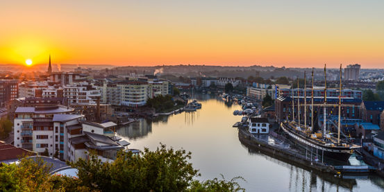 An aerial view of the Bristol harbour with a beautiful sunrise