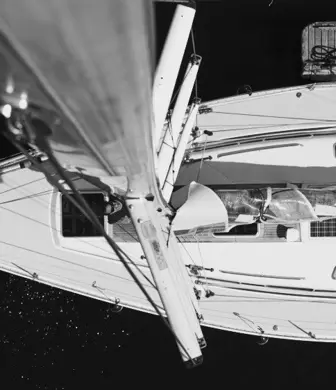 An aerial view of a yacht taken from the top of the mast