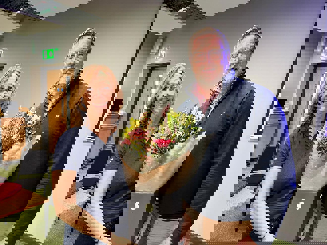 Susan and Gavin at the AGM holding flowers