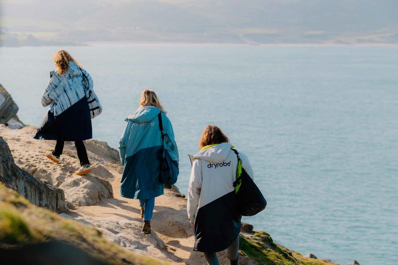 three hikers wearing dryrobes
