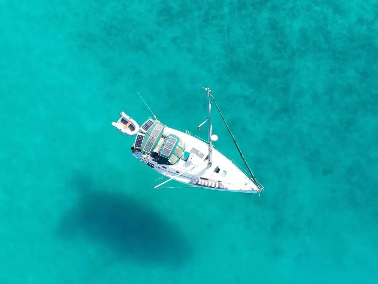 The bohemia yacht floating in bright blue waters