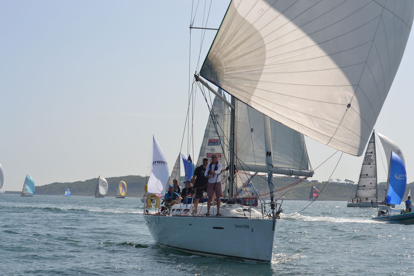 Yacht travelling along sparkling waters