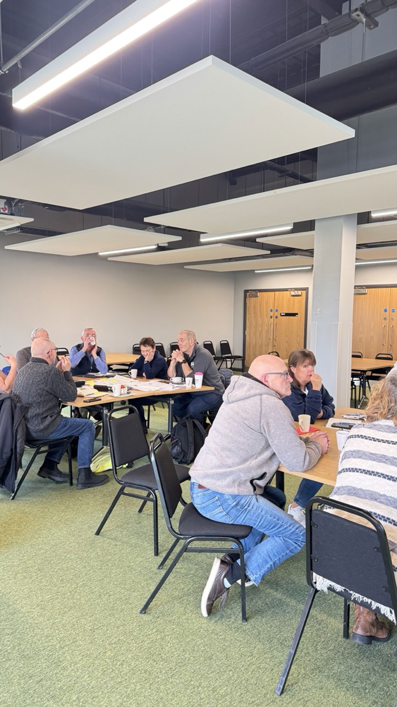 Group of participants listening at the event