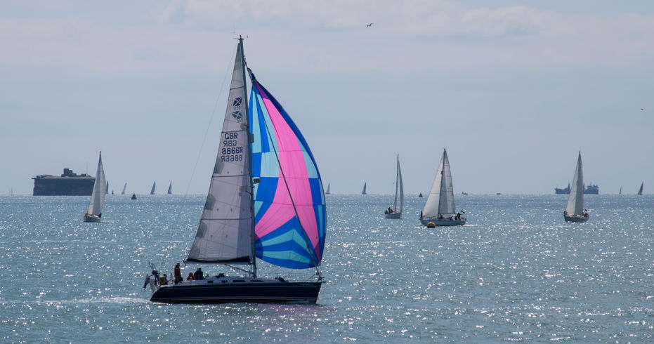 boats sailing across sparkling waters