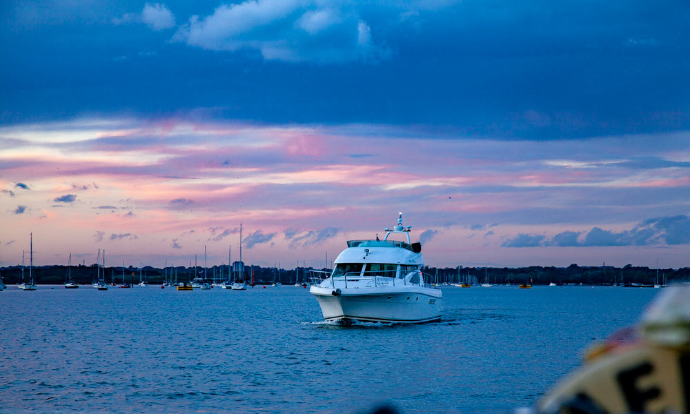 Early evening powerboat sailing as the daylight fades