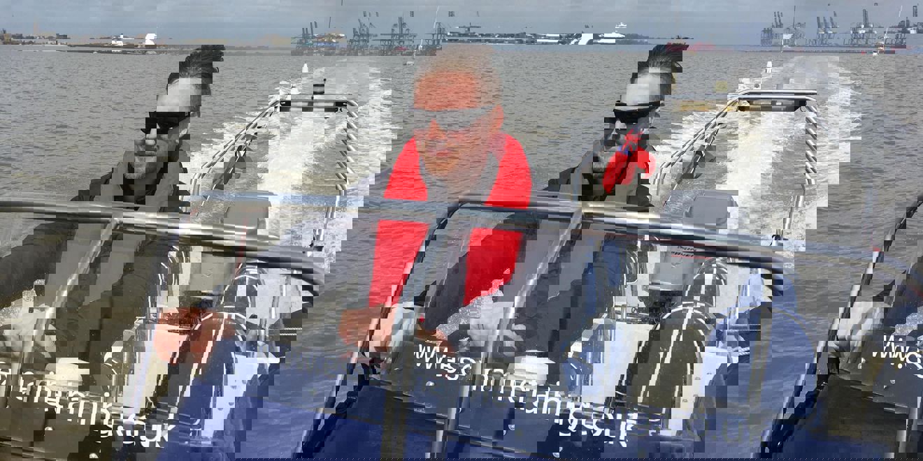 man driving a Rib powerboat on the Southampton waters