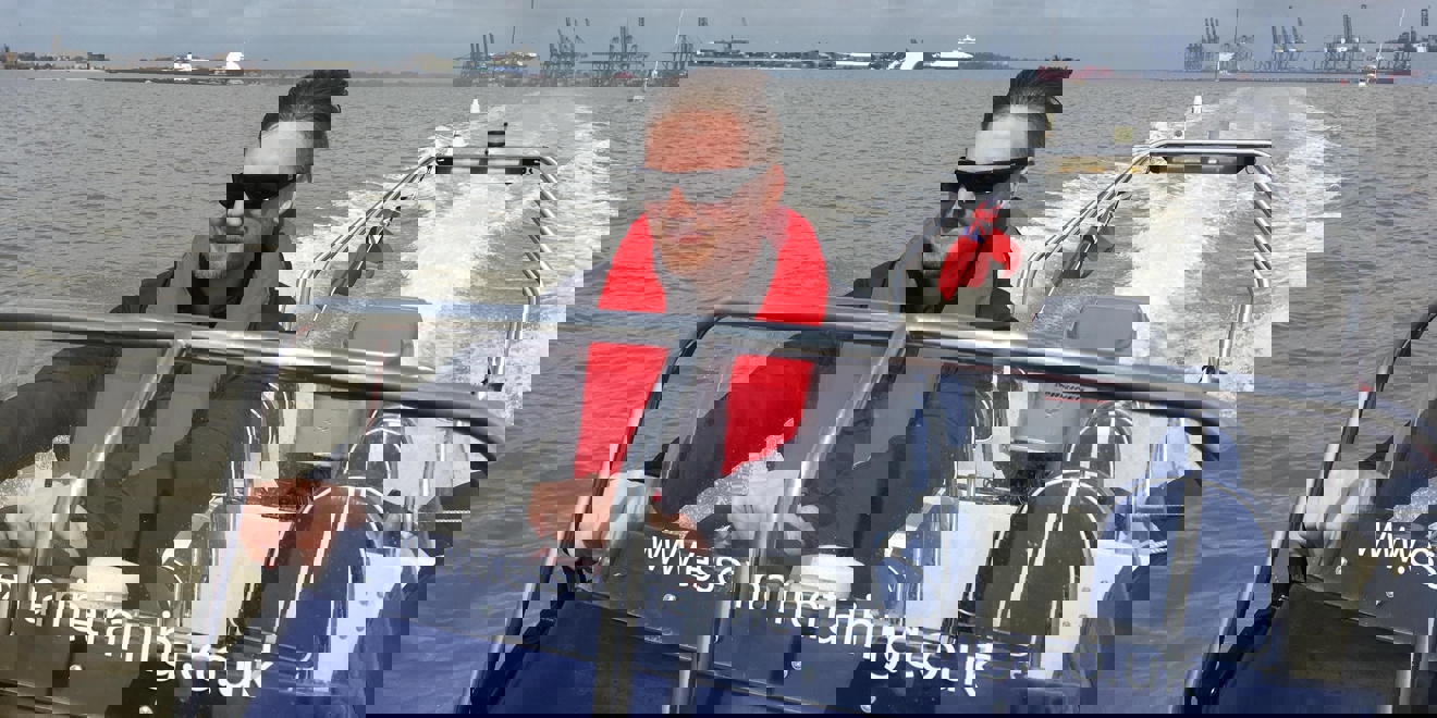 man driving a Rib powerboat on the Southampton waters
