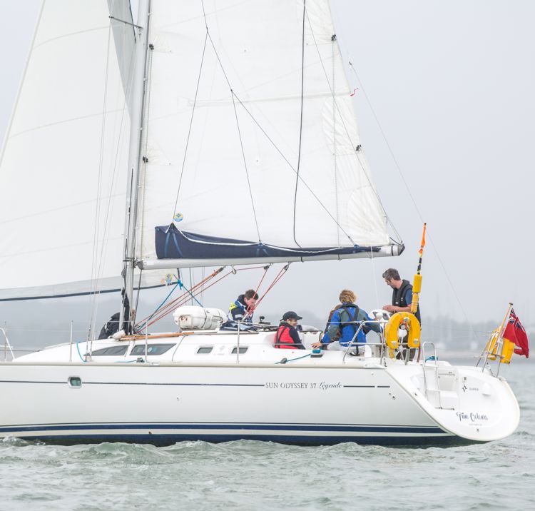 crew working together on yachtmaster fasttrack course