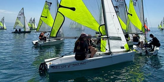 A Welsh Sailing brand new RS Feva in action on a sunny day at the class nationals at Pwllheli in May 2026. 
