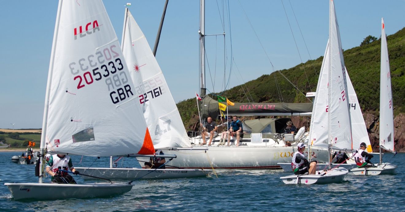 Committee boat and ILCA sailors at Welsh Club Championships (c) Ade Owens